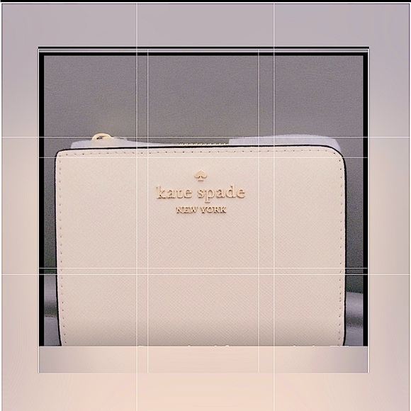 kate spade Handbags - kate spade Cream and Black Compact Zip Wallet